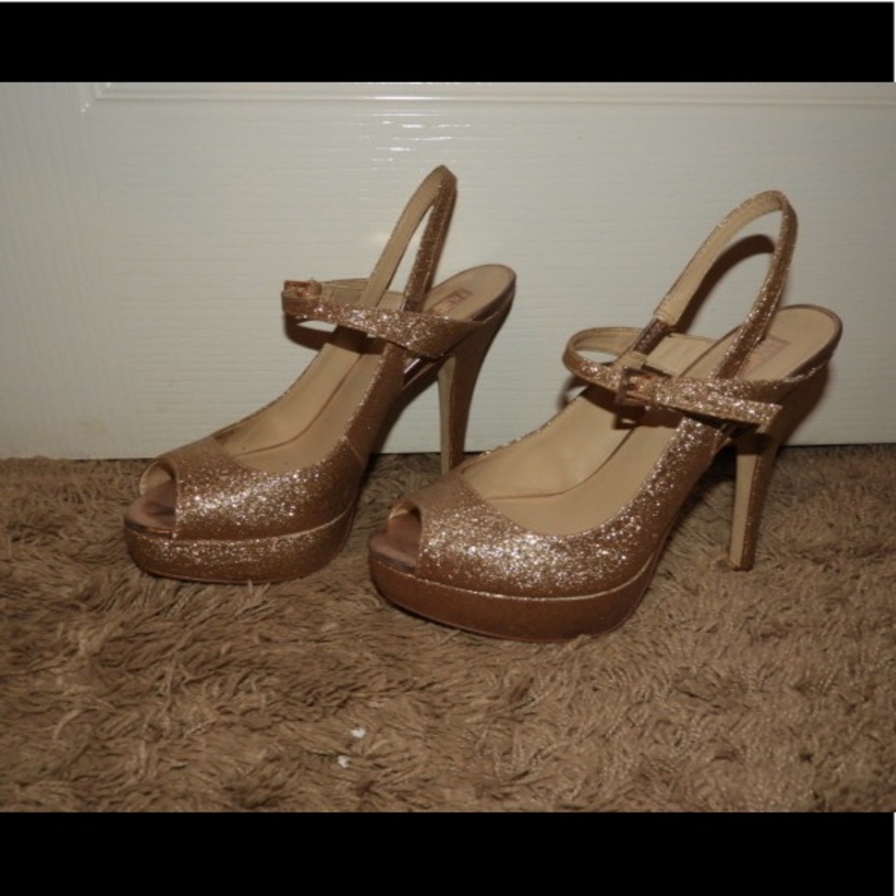 Open toed gold heels